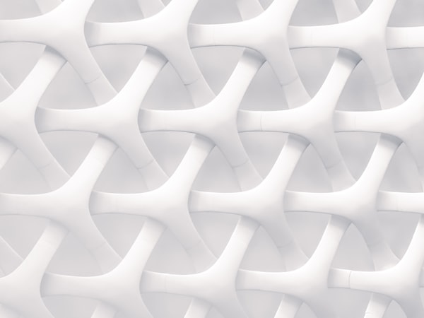Repeating cylindrical facade with regular window grid, abstract architectural rhythm